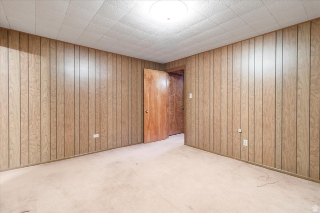 217 East 400 South Spring City, UT 84662 - Photo 38 of 71 Unfurnished room featuring light colored carpet and wood walls