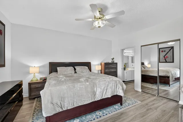 an aerial view of a house with a garden and swimming pool