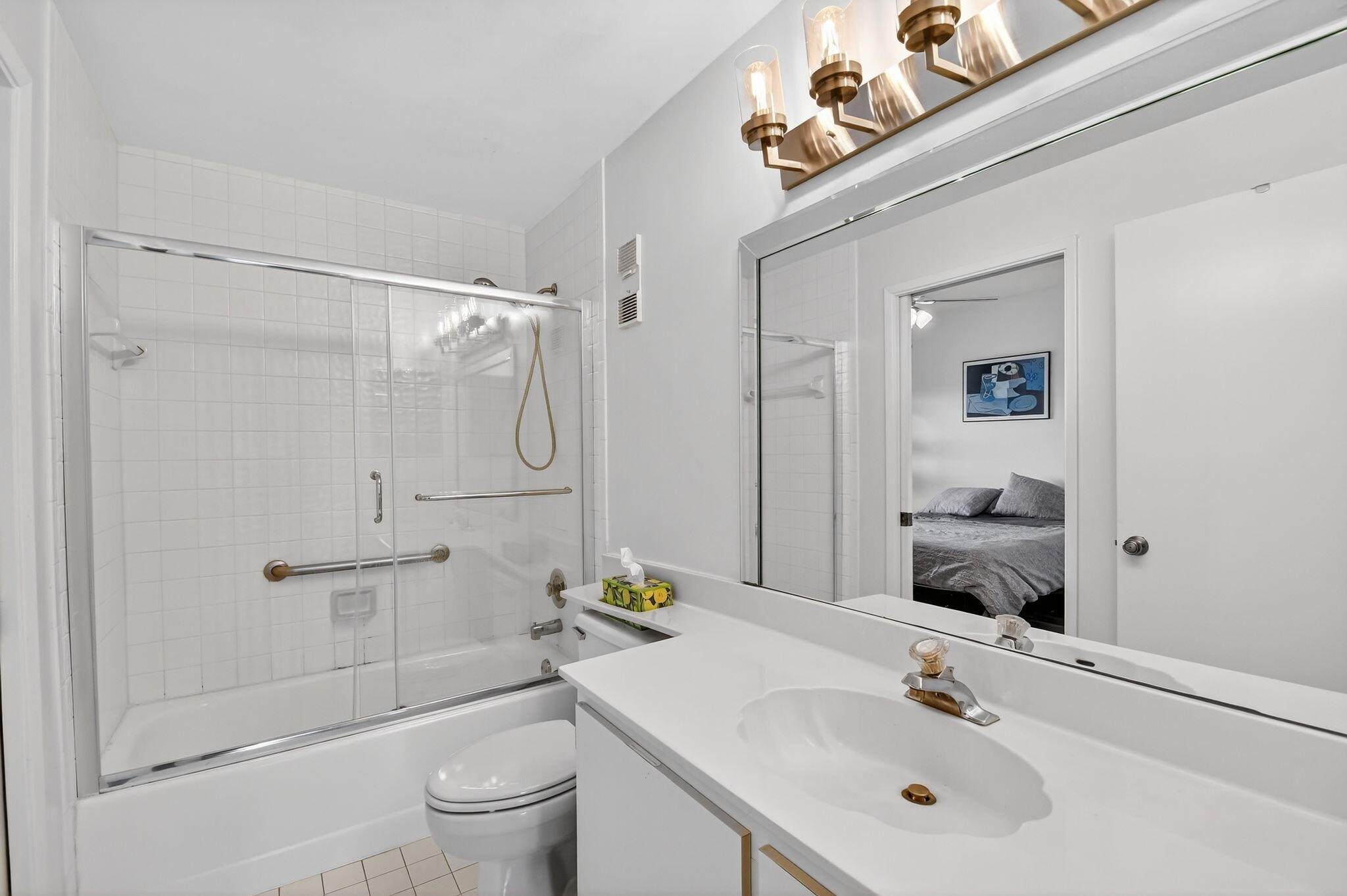 6193 Pointe Regal Circle, Unit 402 Delray Beach, FL 33484 - Photo 31 of 104 a bathroom with a sink a toilet and shower