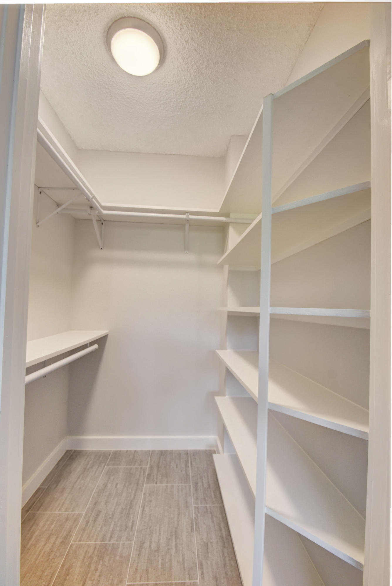 9355 Southwest 8th Street, Unit 120 Boca Raton, FL 33428 - Photo 14 of 21 MASTER BEDROOM CLOSET