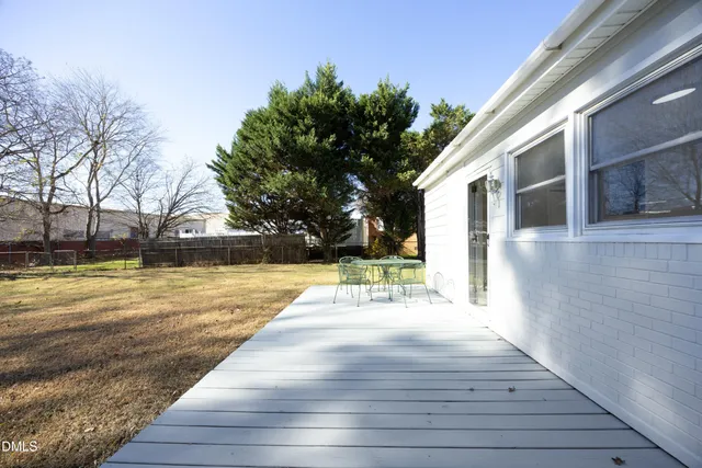 a view of outdoor space yard swimming pool and trees