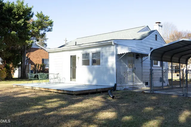 a view of road with large trees