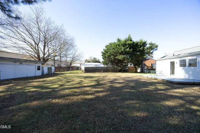 a view of swimming pool with outdoor seating