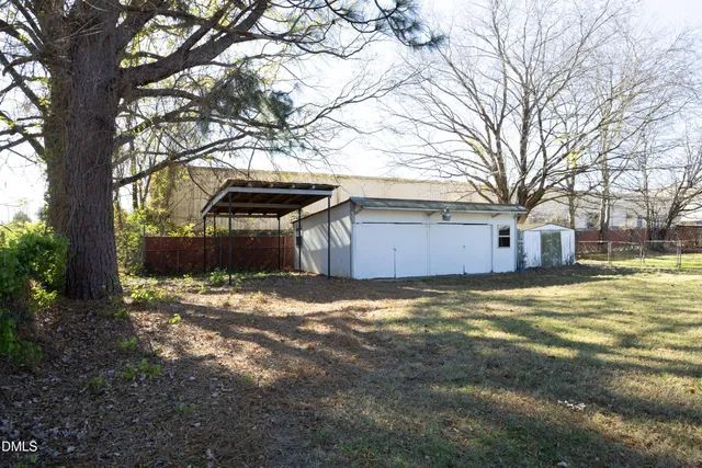a view of a room with wooden walls