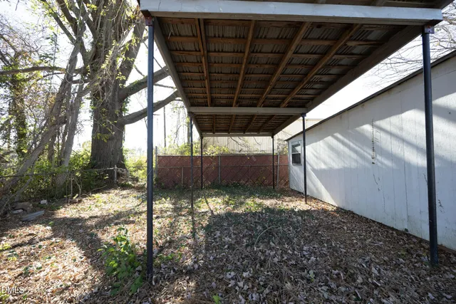 a view of a house with swimming pool