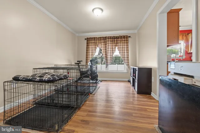 a view of a living room a dining room wooden floor