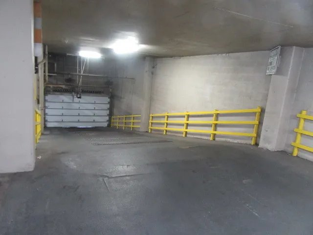 a view of an empty room with stairs