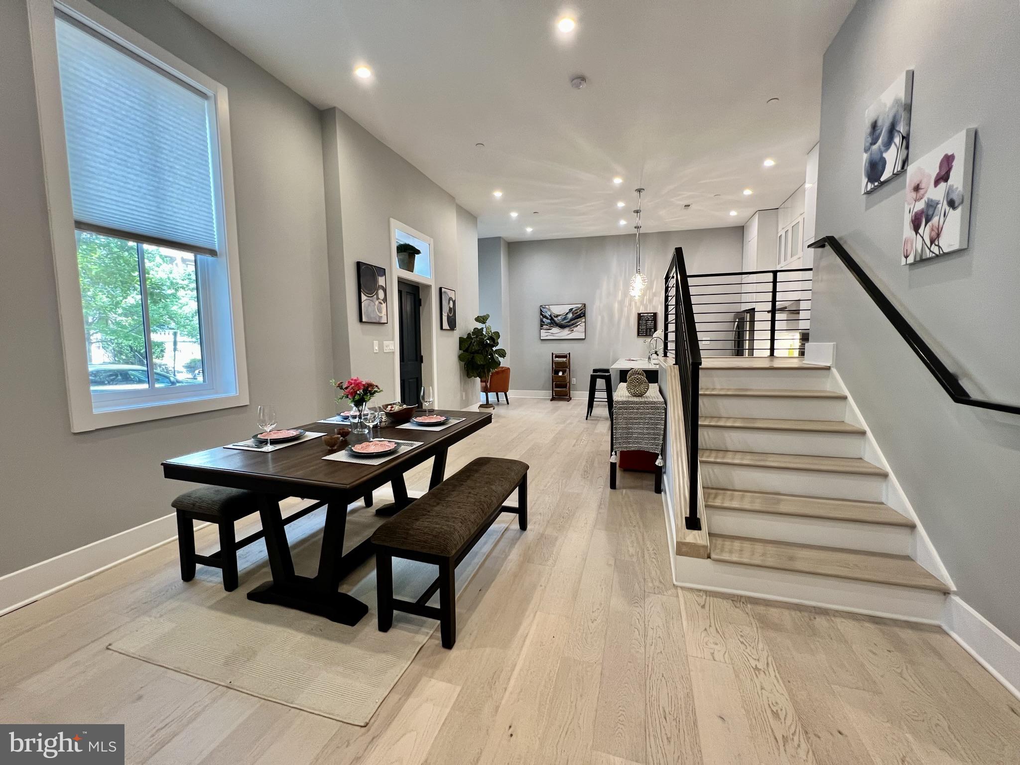 1001 C Street Southeast, Unit 2 Washington, DC 20003 - Photo 15 of 86 A small table in a large dining area!