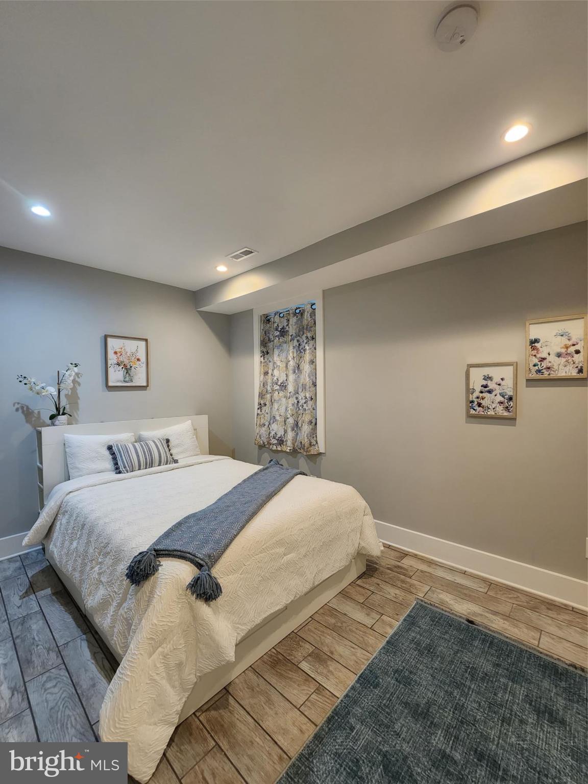 1001 C Street Southeast, Unit 2 Washington, DC 20003 - Photo 47 of 86 Primary bedroom, w/ windows open in the Spring