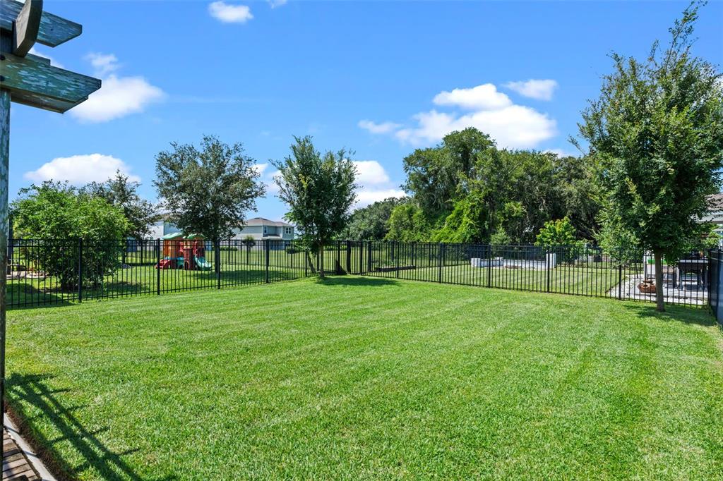 5164 Chickadee Street St. Cloud, FL 34771 - Photo 26 of 35 a view of a park with trees