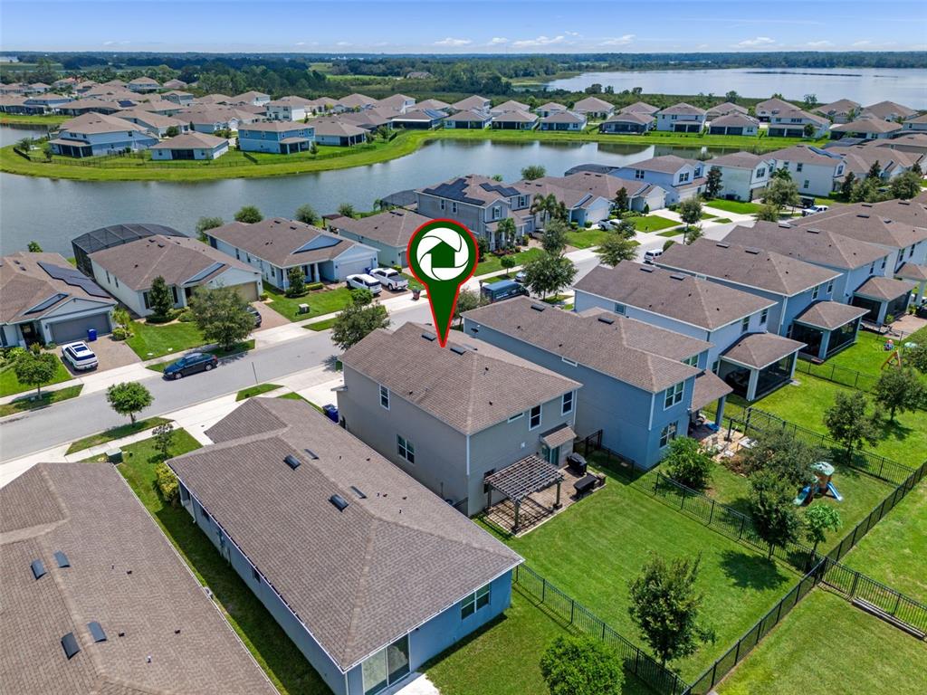 5164 Chickadee Street St. Cloud, FL 34771 - Photo 29 of 35 an aerial view of a house with a swimming pool
