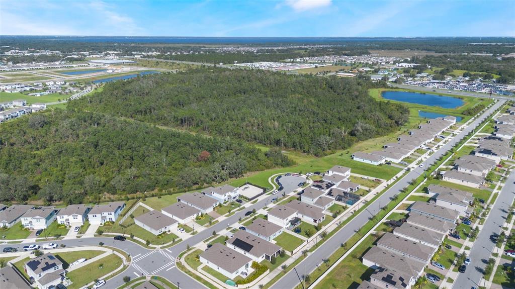 5164 Chickadee Street St. Cloud, FL 34771 - Photo 31 of 35 a view of a city with an ocean