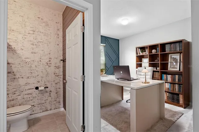 a view of bathroom with a toilet sink and shower