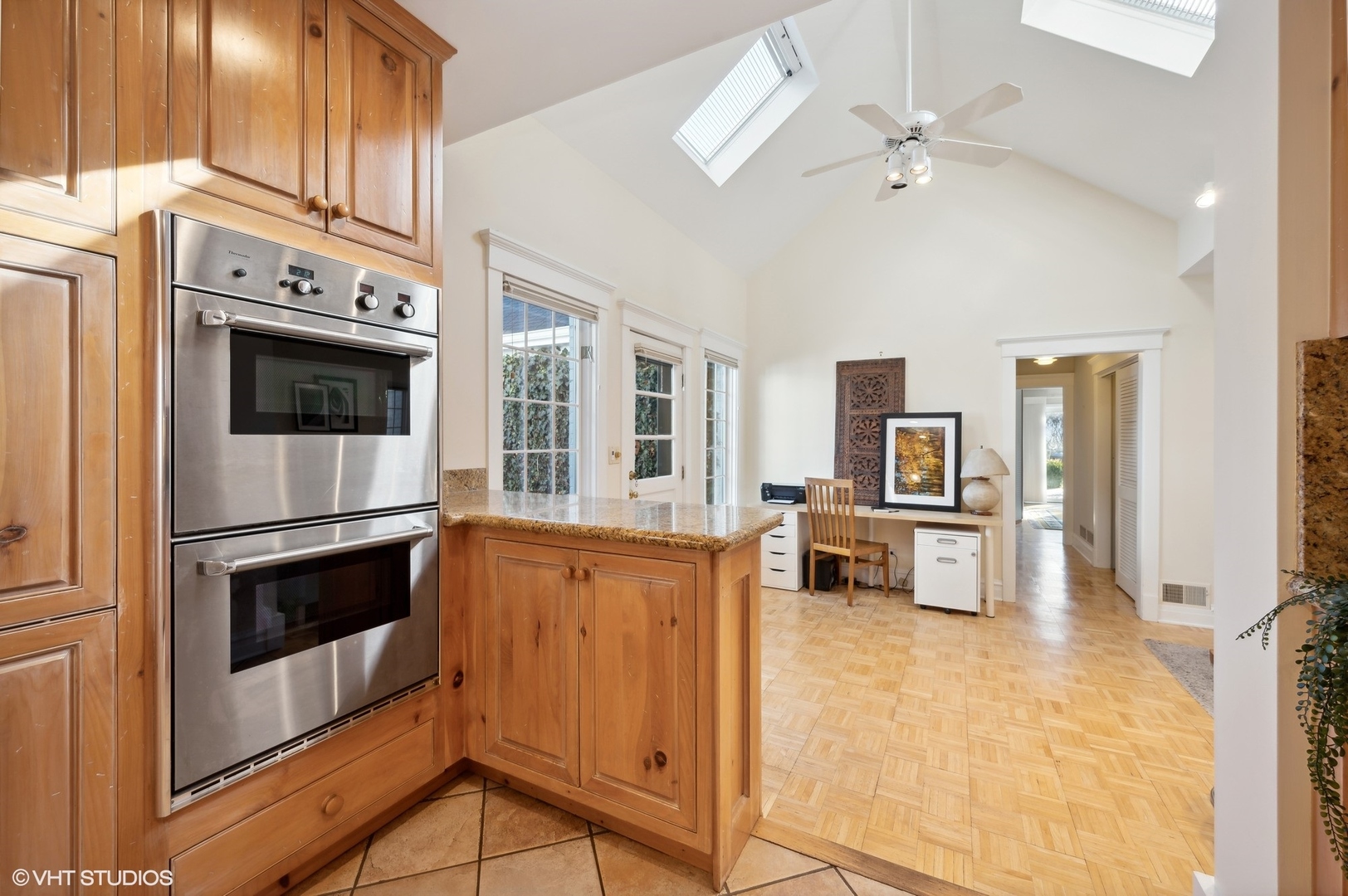 2048 Wagner Road Glenview, IL 60025 - Photo 11 of 37 a kitchen with stainless steel appliances a stove a microwave and a refrigerator