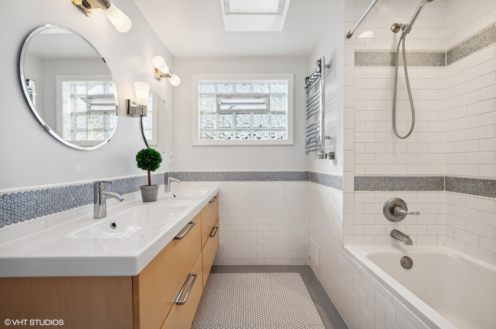 2048 Wagner Road Glenview, IL 60025 - Photo 19 of 37 a bathroom with a sink a toilet and a mirror