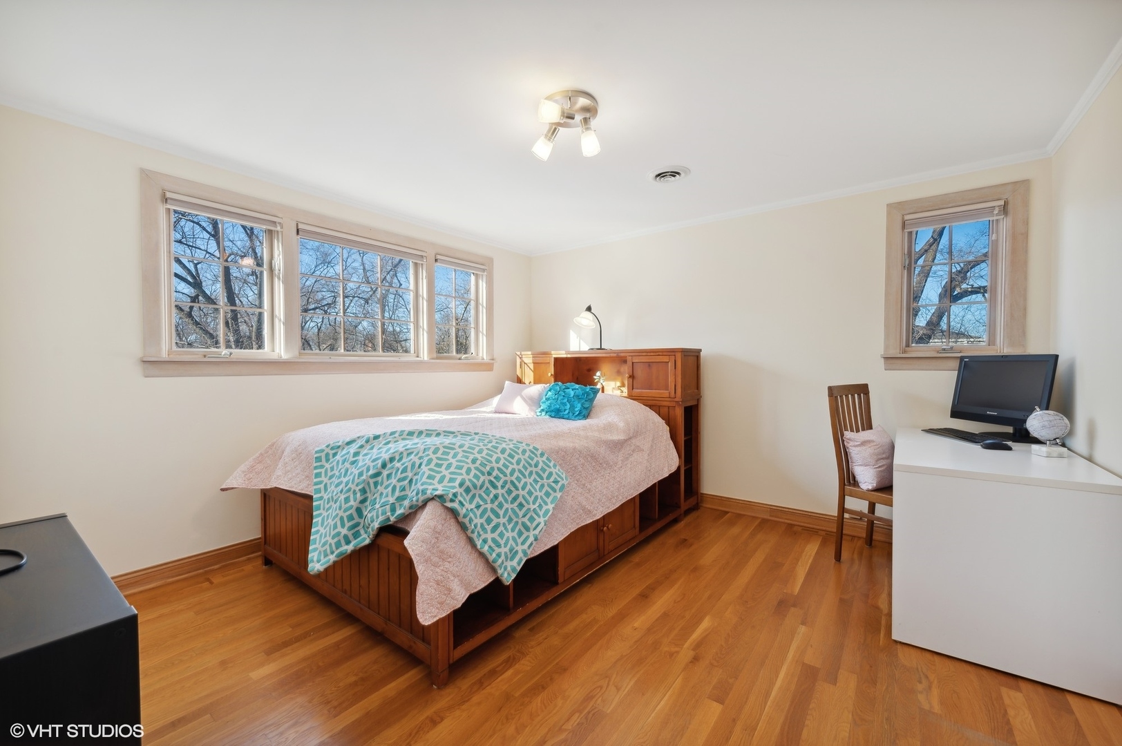 2048 Wagner Road Glenview, IL 60025 - Photo 20 of 37 a bedroom with a bed and wooden floor
