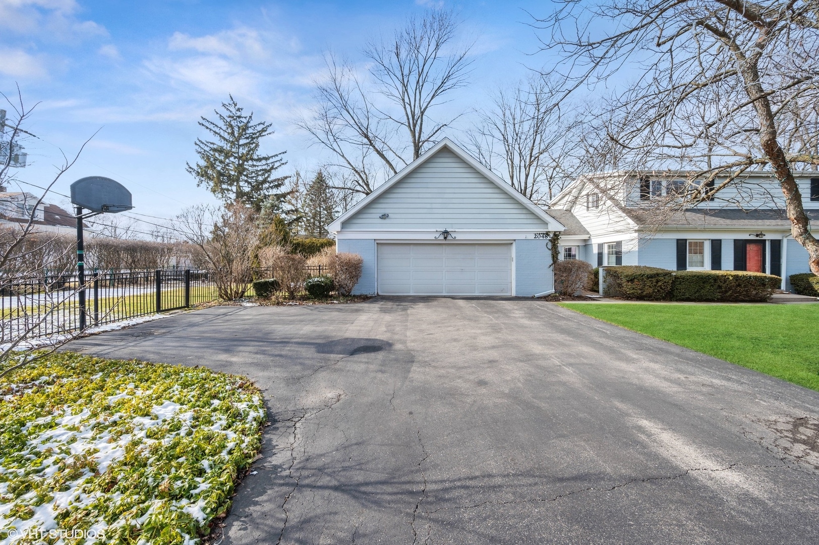 2048 Wagner Road Glenview, IL 60025 - Photo 25 of 37 a view of a house with a yard and large tree