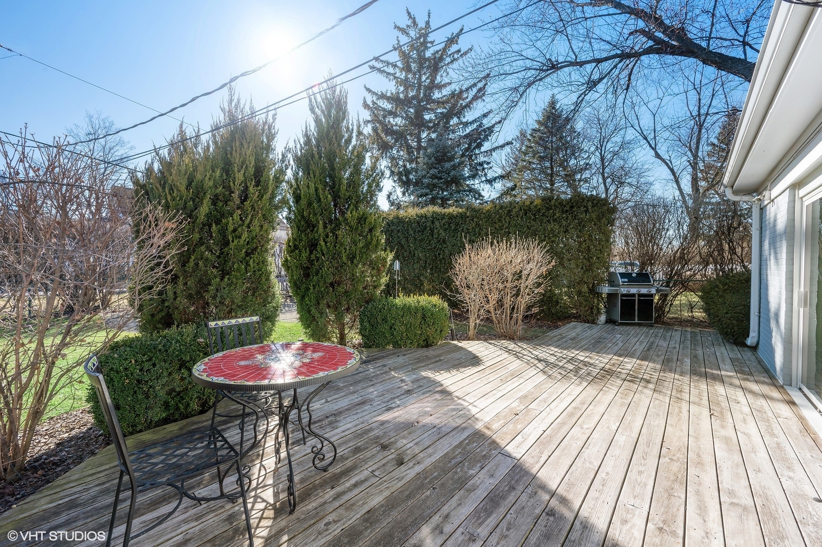 2048 Wagner Road Glenview, IL 60025 - Photo 26 of 37 a backyard of a house with table and chairs