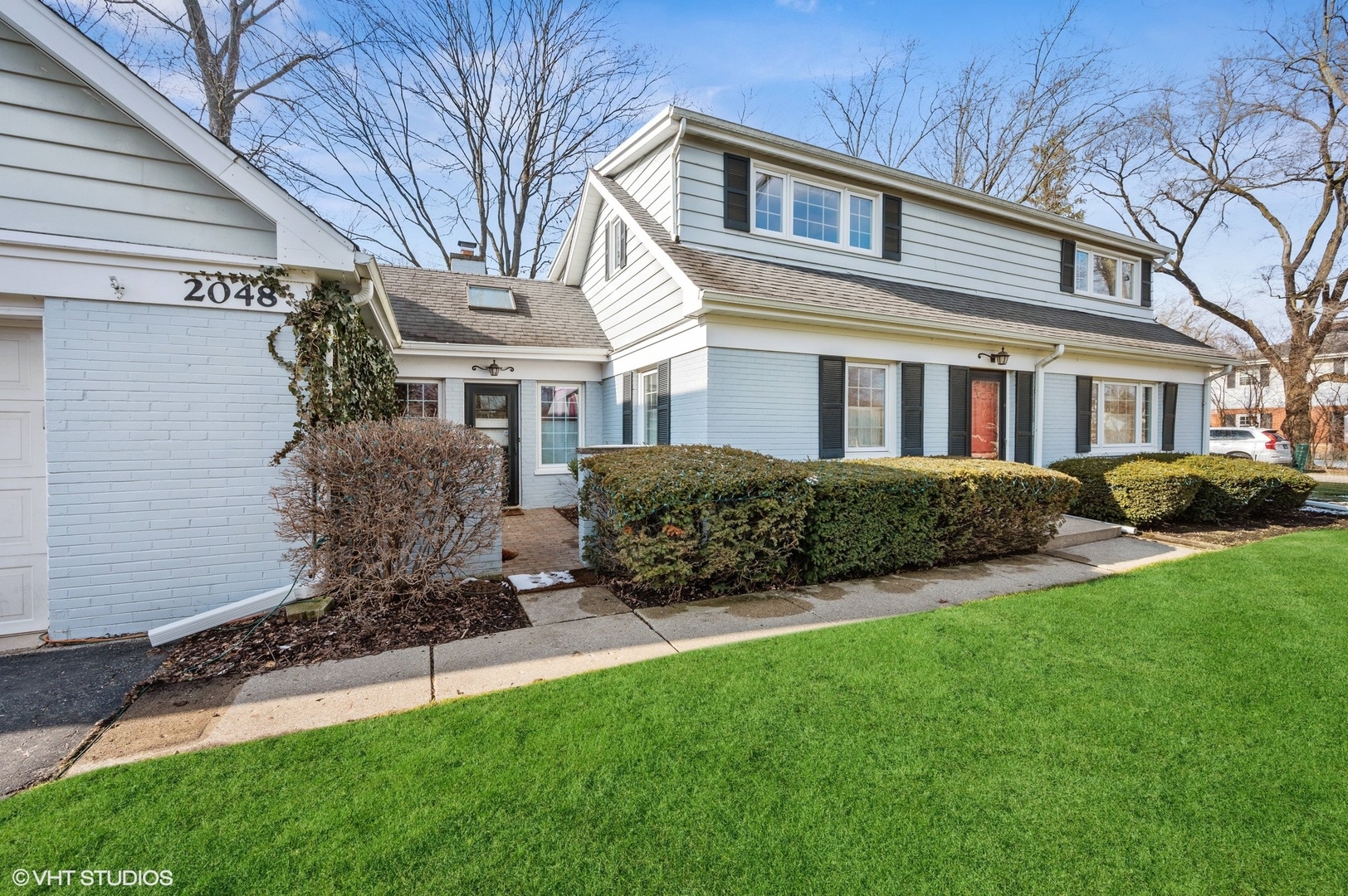 2048 Wagner Road Glenview, IL 60025 - Photo 33 of 37 a front view of a house with garden