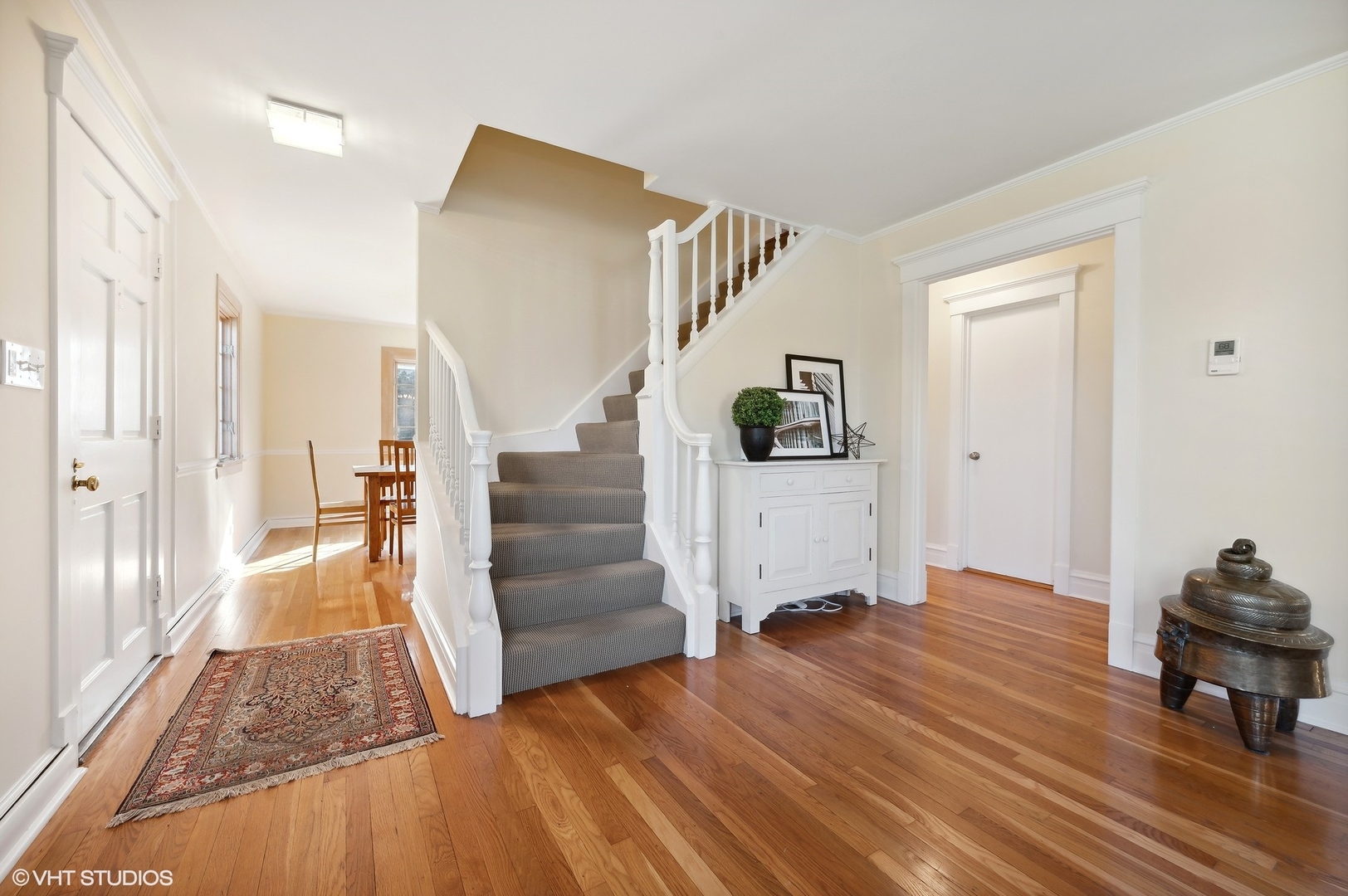 2048 Wagner Road Glenview, IL 60025 - Photo 4 of 37 a view of a livingroom with wooden floor and stairs