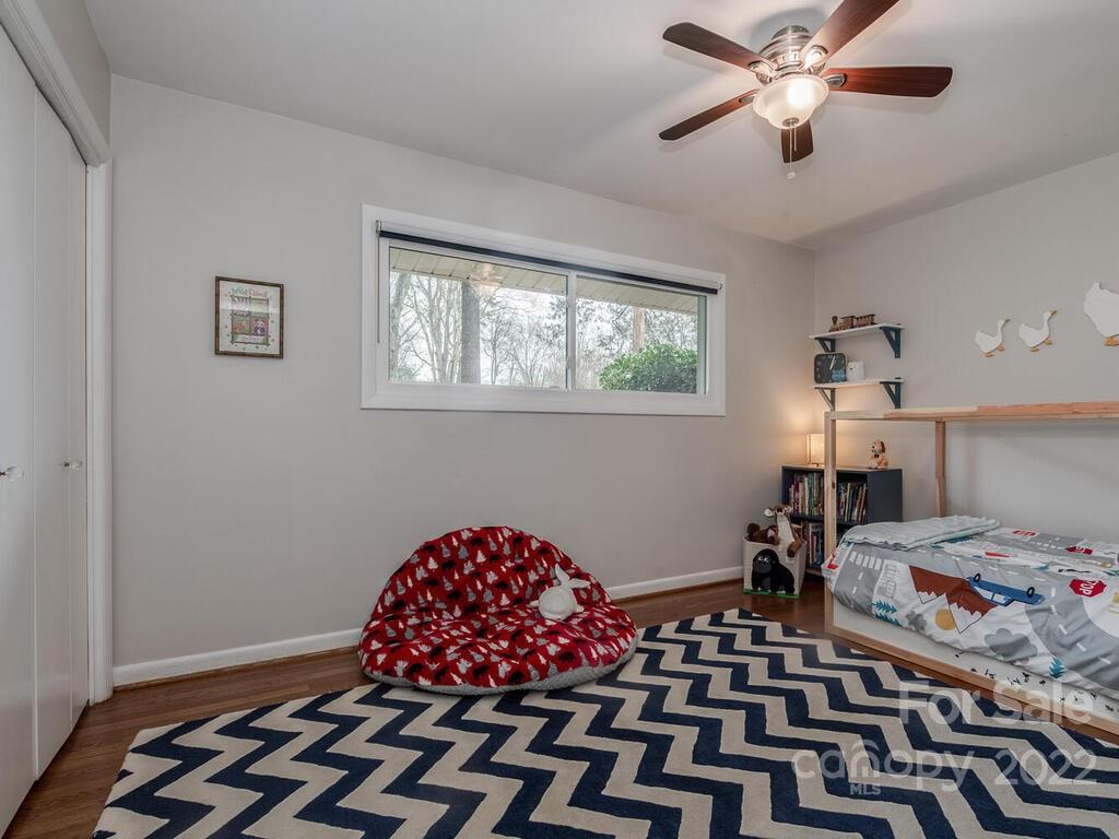 608 Robmont Road Charlotte, NC 28270 - Photo 18 of 25 a bedroom with furniture and a window