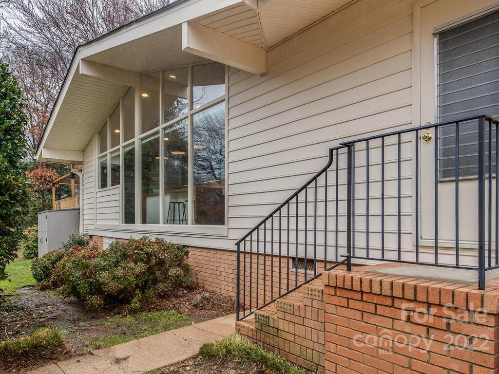 608 Robmont Road Charlotte, NC 28270 - Photo 22 of 25 a view of a house with a roof deck