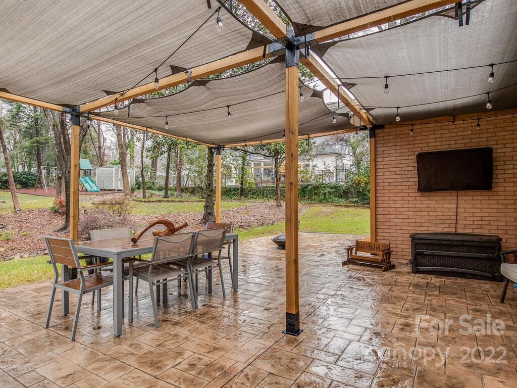 608 Robmont Road Charlotte, NC 28270 - Photo 23 of 25 a outdoor space with lots of tables and chairs