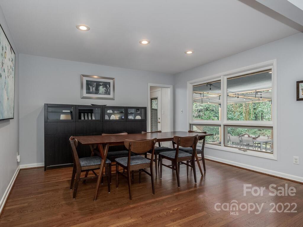 608 Robmont Road Charlotte, NC 28270 - Photo 7 of 25 a view of a dining room with furniture window and wooden floor