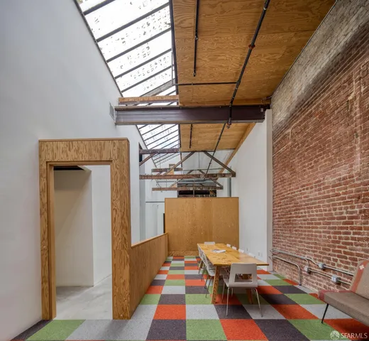 a room with furniture and windows