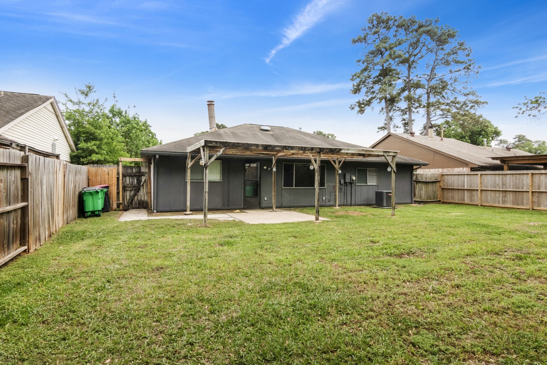 2531 North Spring Drive Spring, TX 77373 - Photo 23 of 24 a front view of a house with a garden