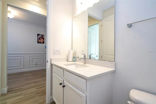 a bedroom with a bed and a cabinets