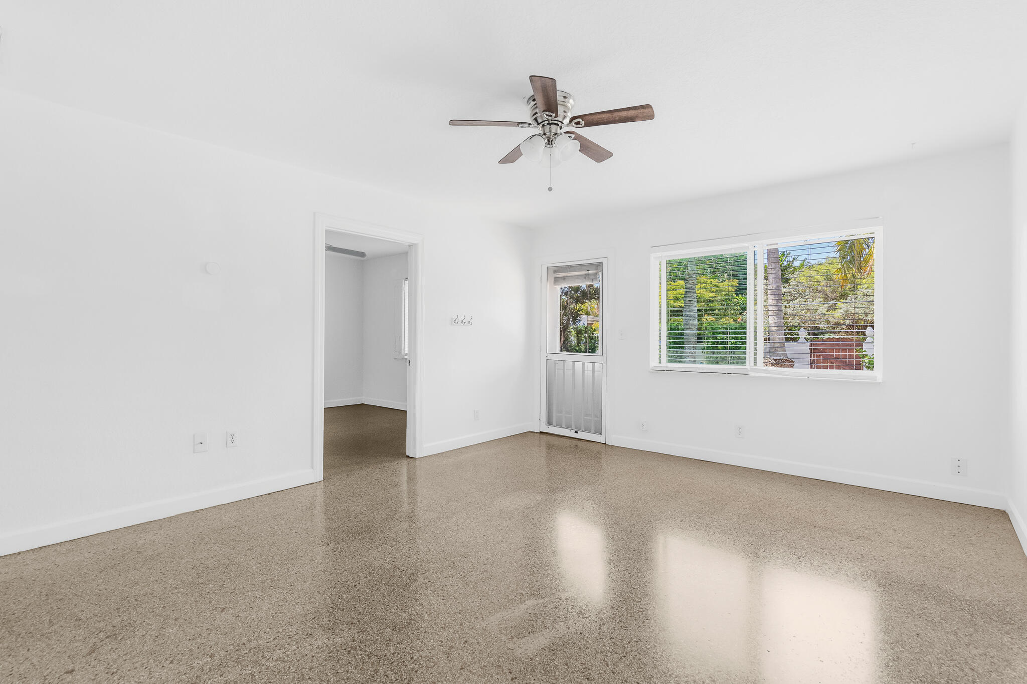 11 Tropical Drive, Unit 3 Ocean Ridge, FL 33435 - Photo 8 of 15 a view of an empty room with a window