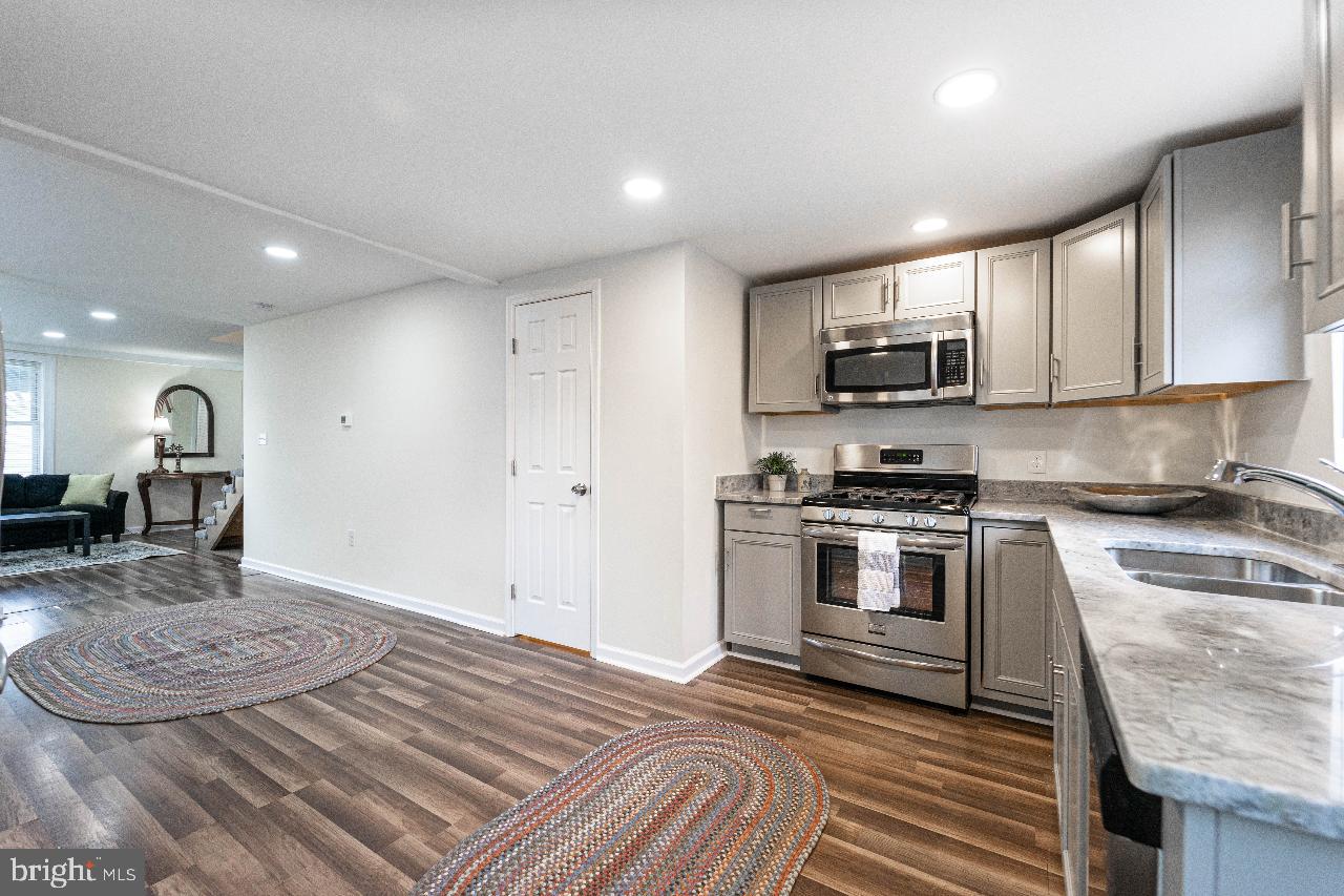 8033 Edgewater Avenue Rosedale, MD 21237 - Photo 11 of 23 Modern kitchen with sleek finishes.