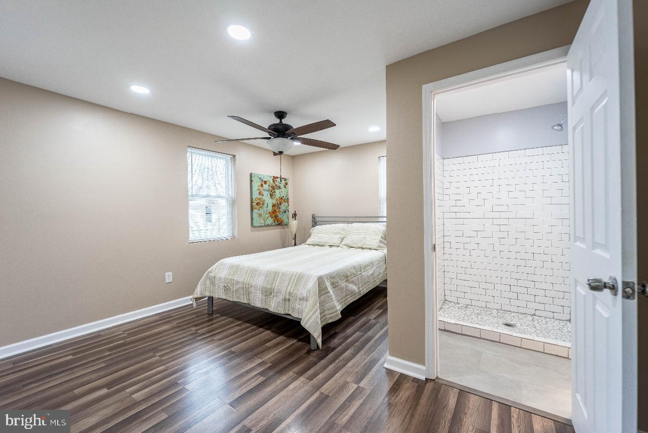 8033 Edgewater Avenue Rosedale, MD 21237 - Photo 15 of 23 Serene bedroom with modern touches.
