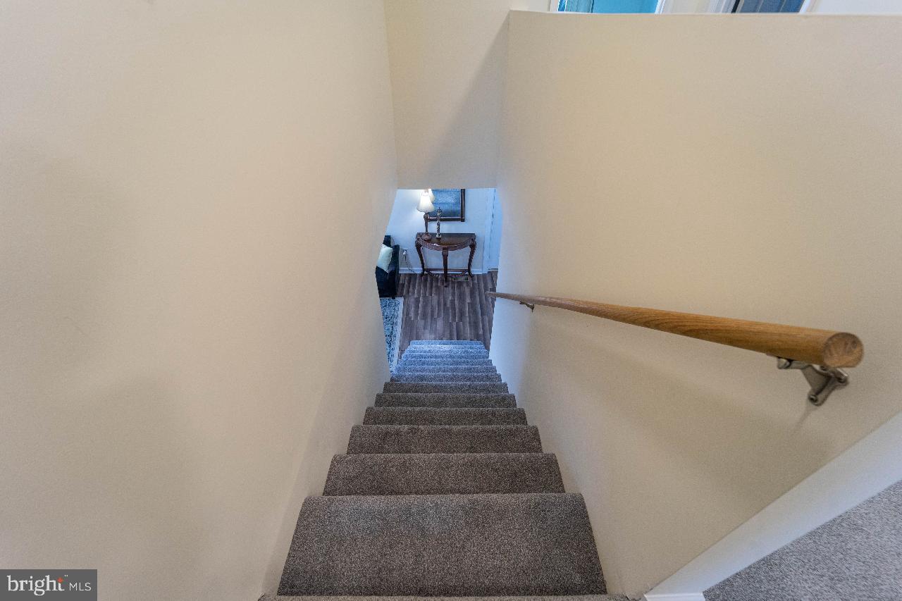8033 Edgewater Avenue Rosedale, MD 21237 - Photo 16 of 23 Inviting staircase to cozy living space.