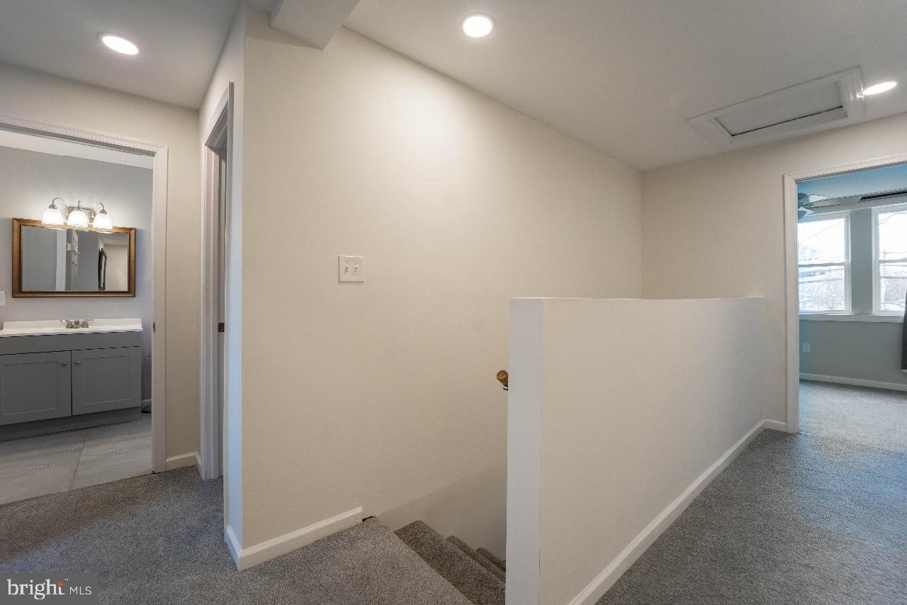 8033 Edgewater Avenue Rosedale, MD 21237 - Photo 17 of 23 Bright and airy hallway retreat.