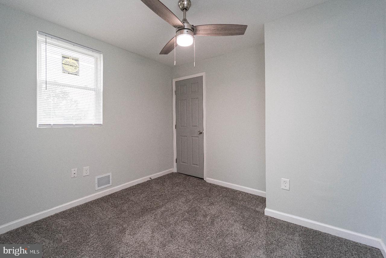 8033 Edgewater Avenue Rosedale, MD 21237 - Photo 19 of 23 Bright and airy room with modern charm.