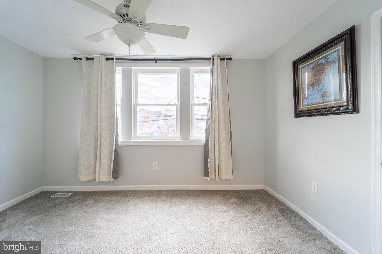 8033 Edgewater Avenue Rosedale, MD 21237 - Photo 21 of 23 Bright and airy room with charm.