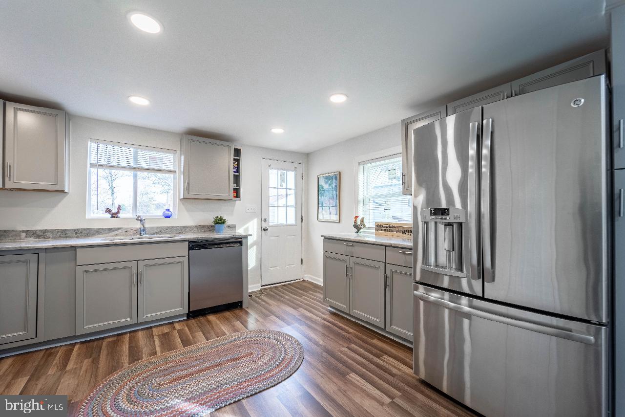 8033 Edgewater Avenue Rosedale, MD 21237 - Photo 9 of 23 Modern kitchen with sleek finishes.