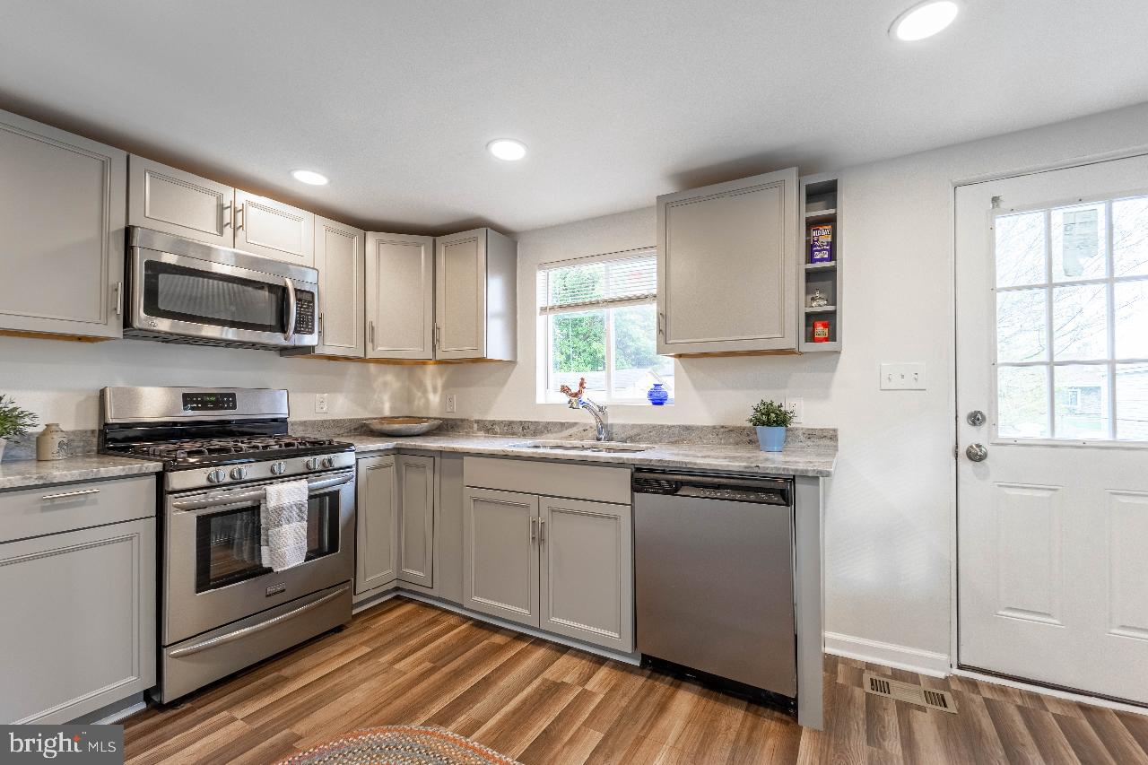 8033 Edgewater Avenue Rosedale, MD 21237 - Photo 10 of 23 Modern kitchen with sleek finishes.