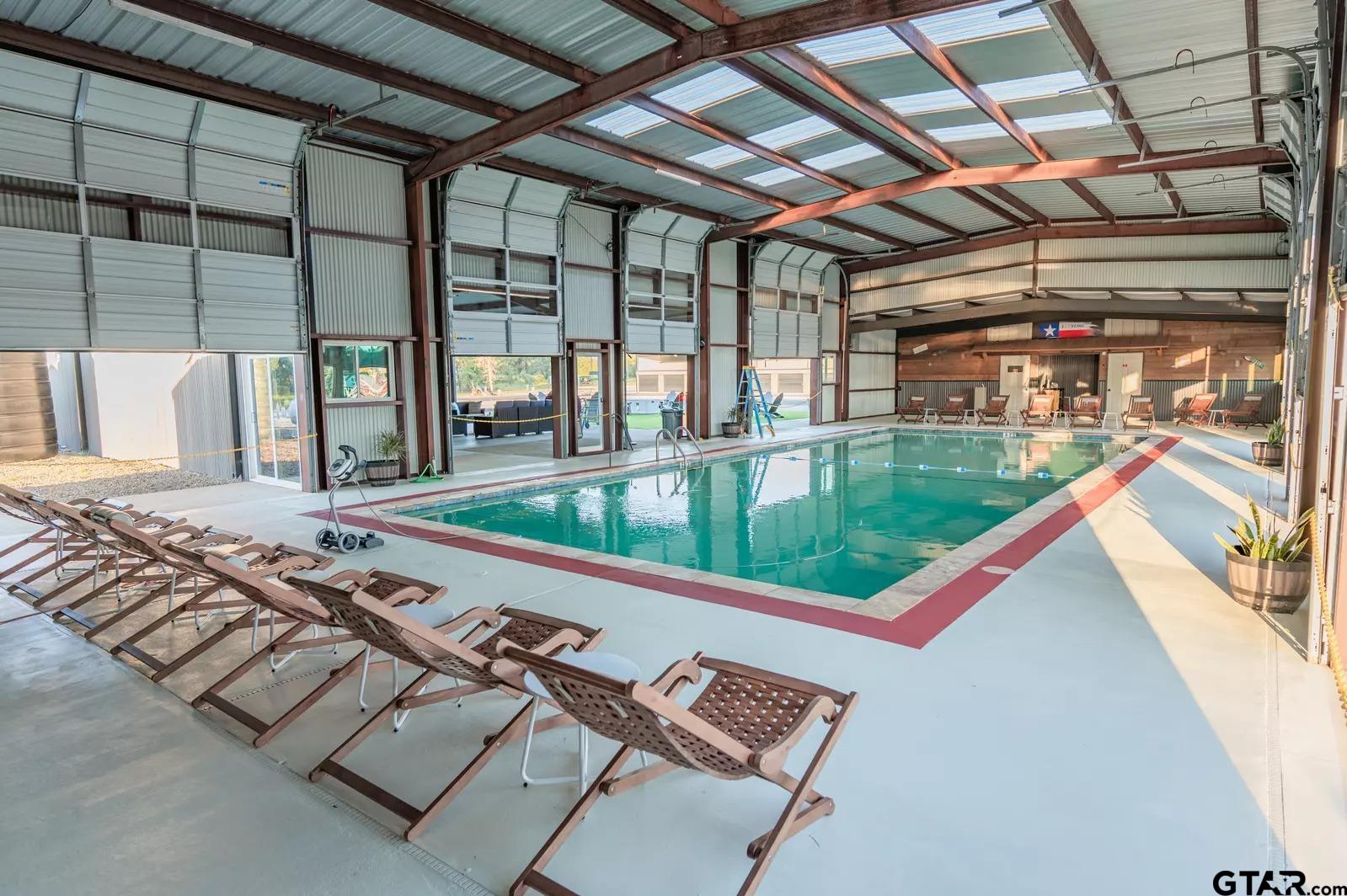 Lot 61 Rocco Drive Mount Pleasant, TX 75455 - Photo 11 of 24 a view of swimming pool with a sitting area