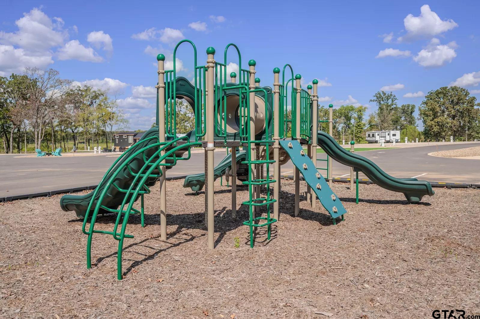 Lot 61 Rocco Drive Mount Pleasant, TX 75455 - Photo 14 of 24 a view of a park with a slide