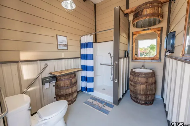 a view of a chairs and table in the balcony