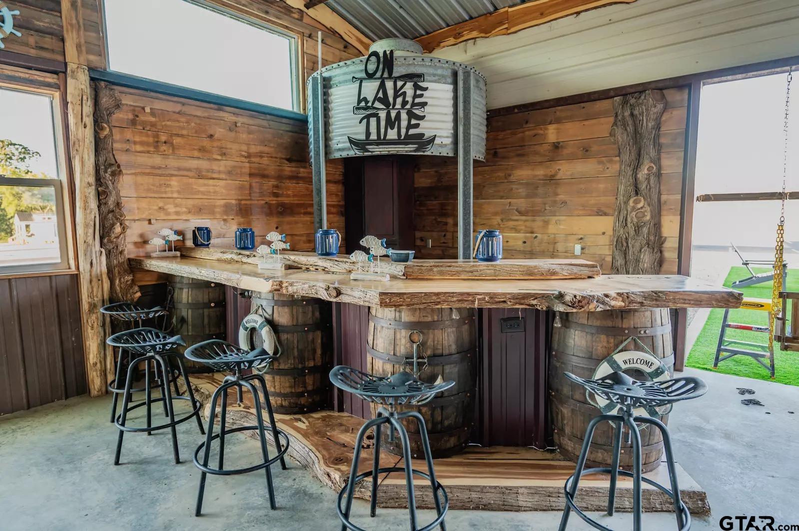 Lot 61 Rocco Drive Mount Pleasant, TX 75455 - Photo 8 of 24 a table with chairs and a stove