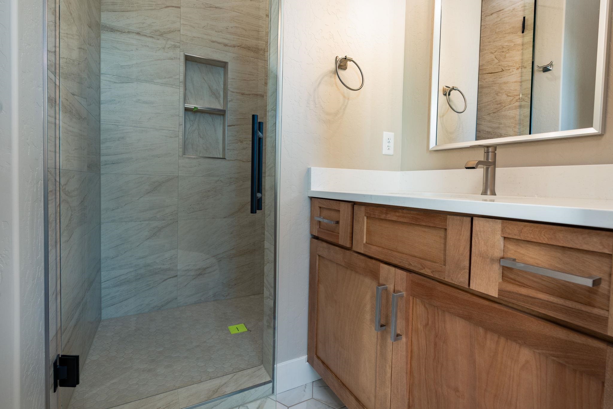 1928 K Road Fruita, CO 81521 - Photo 12 of 32 a bathroom with a sink and a mirror