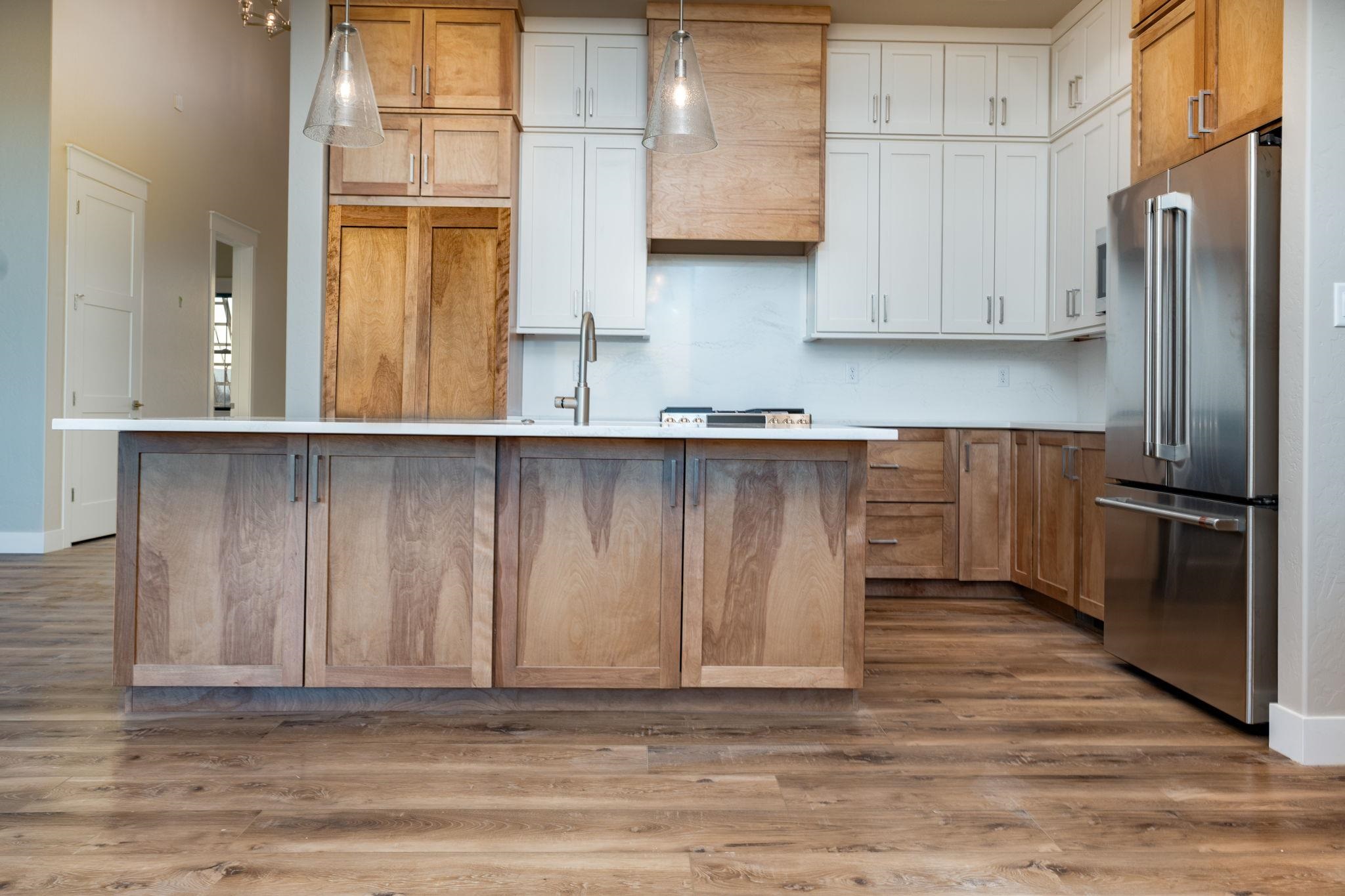 1928 K Road Fruita, CO 81521 - Photo 2 of 32 a kitchen with stainless steel appliances granite countertop a refrigerator and a sink