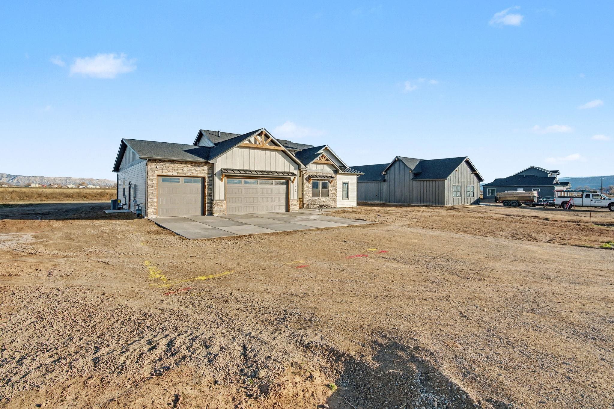 1928 K Road Fruita, CO 81521 - Photo 29 of 32 a view of a house with a ocean view
