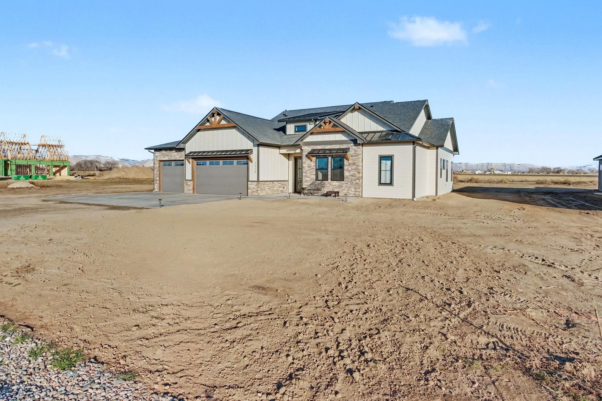 1928 K Road Fruita, CO 81521 - Photo 30 of 32 a view of a house with a ocean view