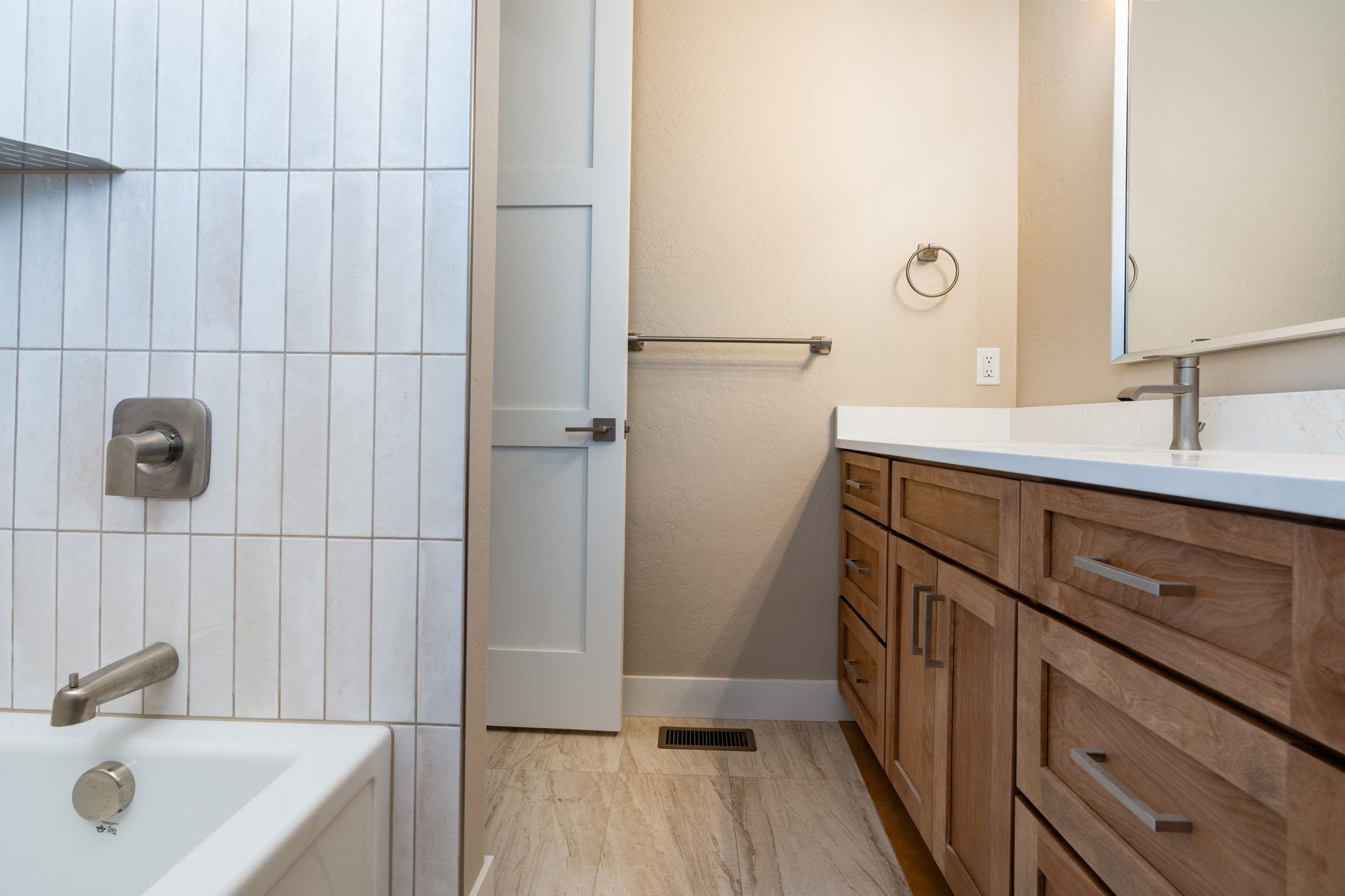1928 K Road Fruita, CO 81521 - Photo 3 of 32 a bathroom with a sink and a tub