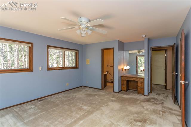 19065 Deerfield Road Monument, CO 80132 - Photo 24 of 49 master bedroom